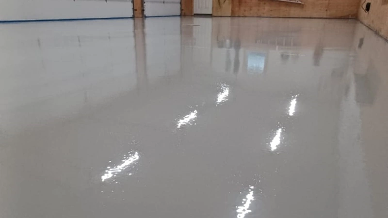 An epoxy warehouse flooring installation for a property in Winnipeg.